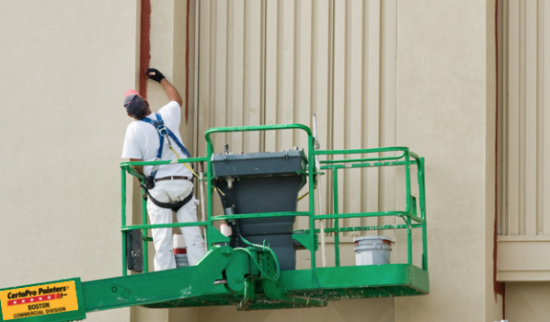 commercial exterior painter on lift