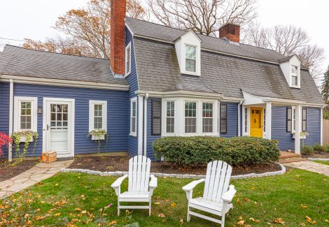 Blue & White Exterior With Yellow Front Door