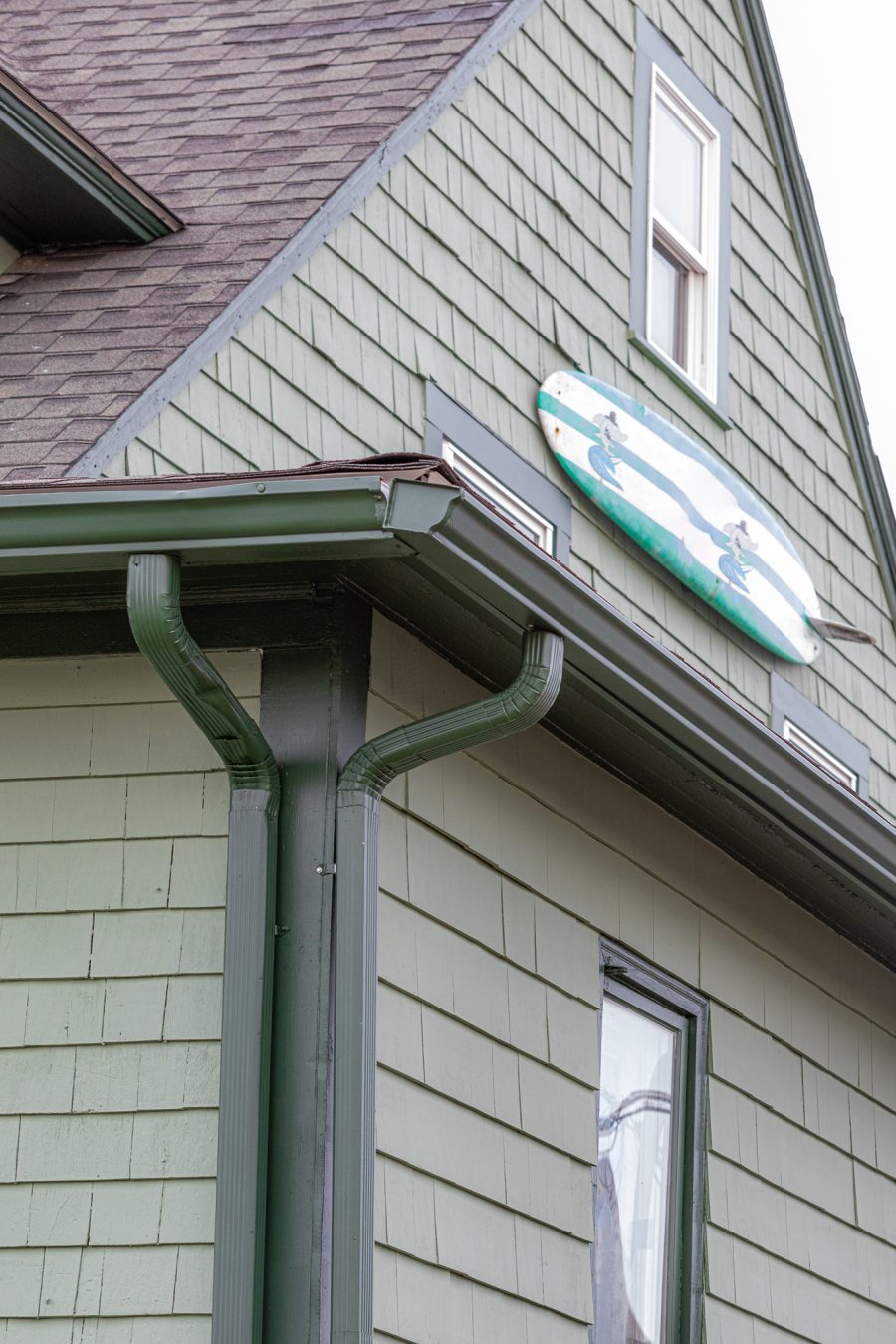 Dark green trim on light green stained shingle siding Preview Image 2
