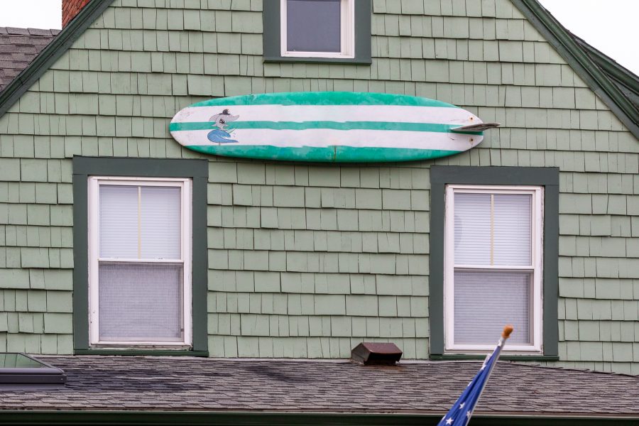 Surfboard mounted on side of newly painted and stained home in Hull, MA Preview Image 3