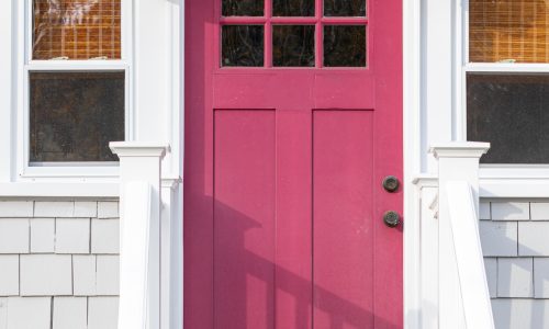 Pink Front Door on White Home