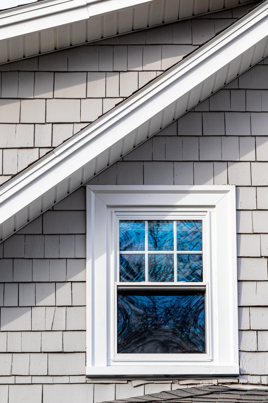 Close view of painted window trim and shingles. Preview Image 5