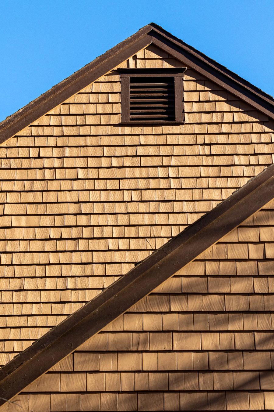 Stained shingles and painted trim line. Preview Image 4