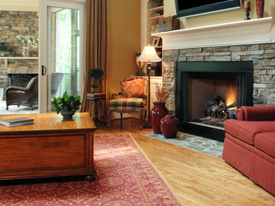 Family room with fireplace and TV over fireplace