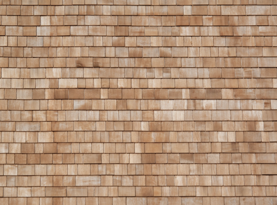 Wall of clean and bright cedar shingles in a light beige color