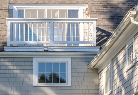 White painted balcony banister on home in Braintree MA