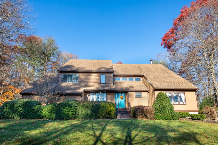 Exterior with brown painted trim and stained cedar shingles. Preview Image 1