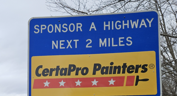 Blue Sponsor a highway sign with Gold CertaPro Painters Logo on it near interstate 95 in Dartmouth area.