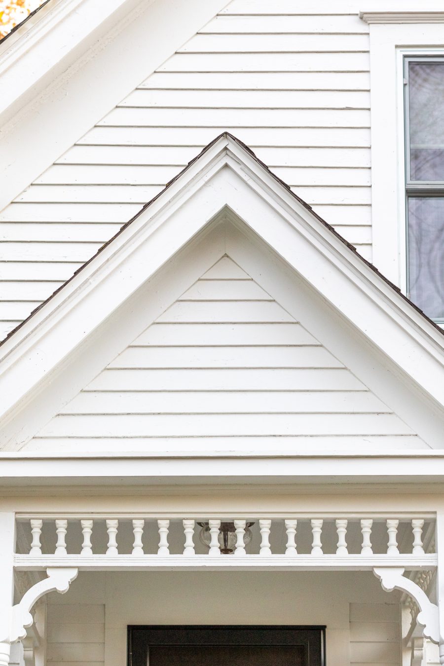Close view of front porch painted white Preview Image 2