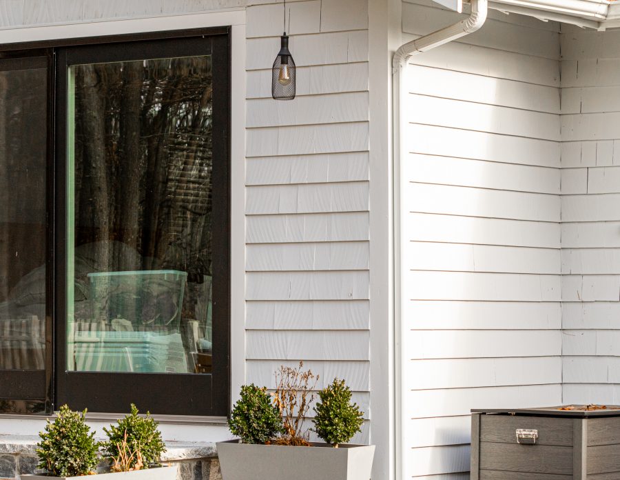 Close view of downspout and white painted trim. Preview Image 7