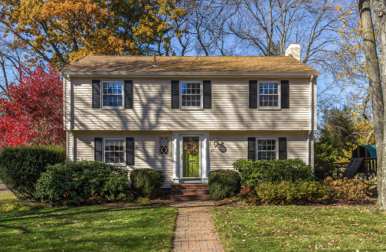 Light tan colonial home in Whitman MA