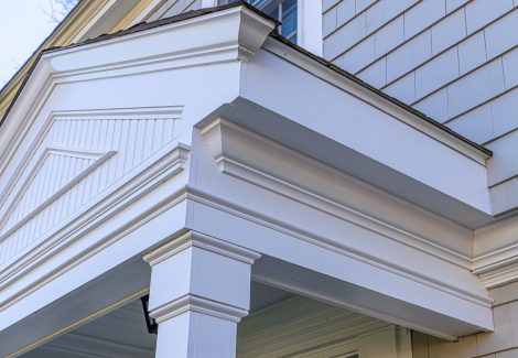 White painted porch banisters and trim