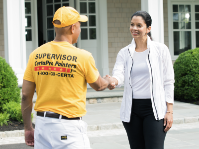 certapro employee and customer shaking hands after painting project