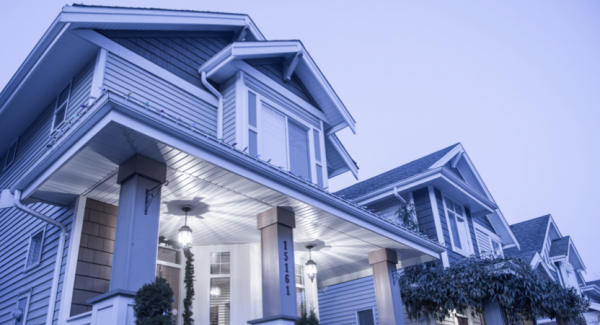 Blue sided condominium with white trim in Hanover, MA