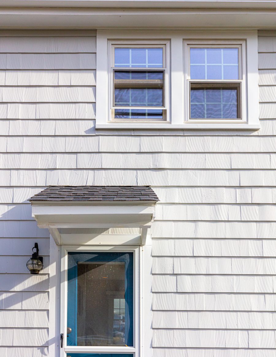 Side entrance of home with painted cedar shingles Preview Image 5