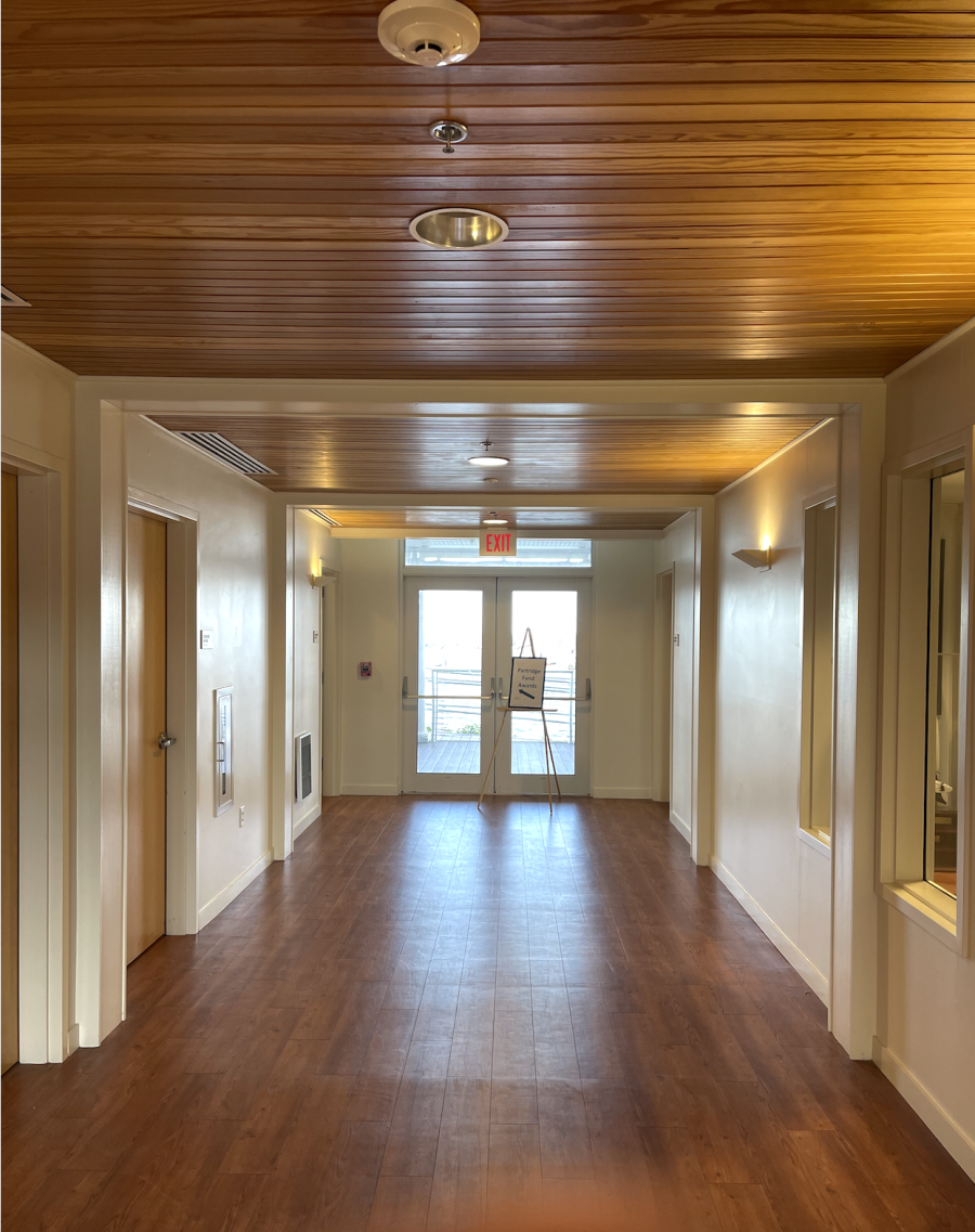 Interior hallway with wood ceiling and floors and freshly painted cream walls Preview Image 1