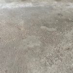 before photo of a bad garage floor