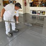 Certapro team applying epoxy finish in boulder