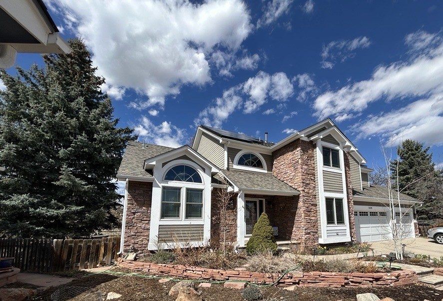 front exterior of house with stone and painted siding Preview Image 3