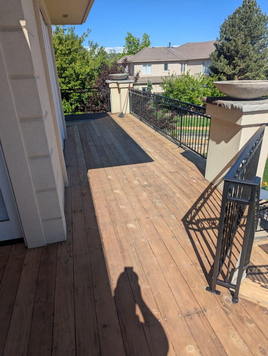 stripped wooden deck with metal railing Preview Image 12