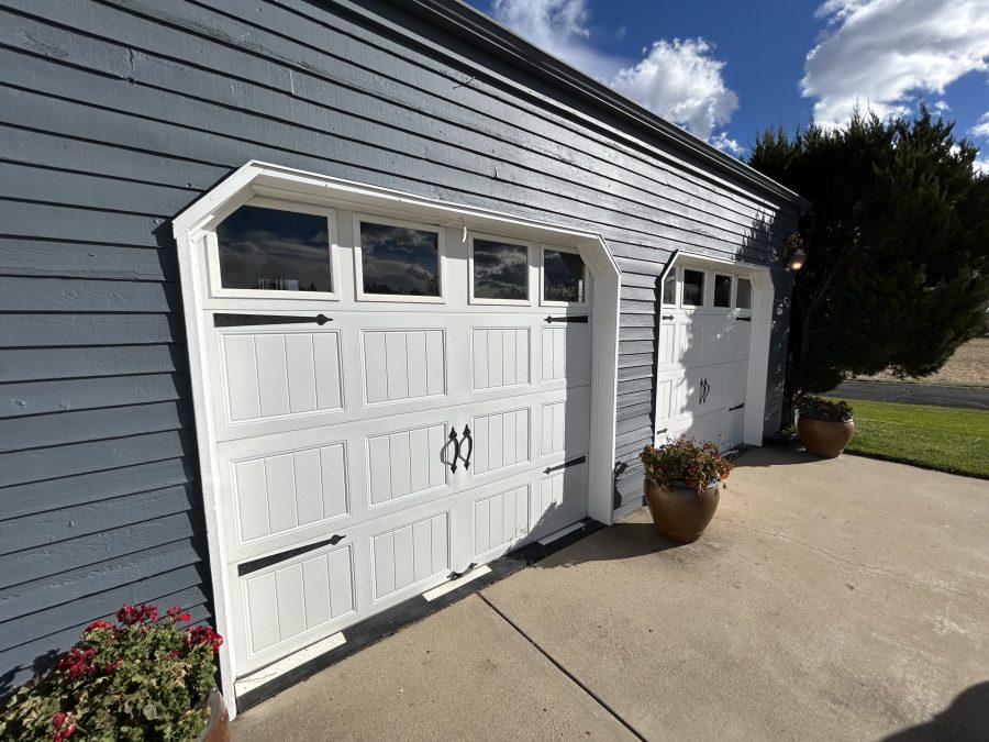 home garage doors with white doors and grey siding Preview Image 4
