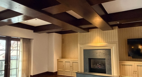 home interior room with exposed beams