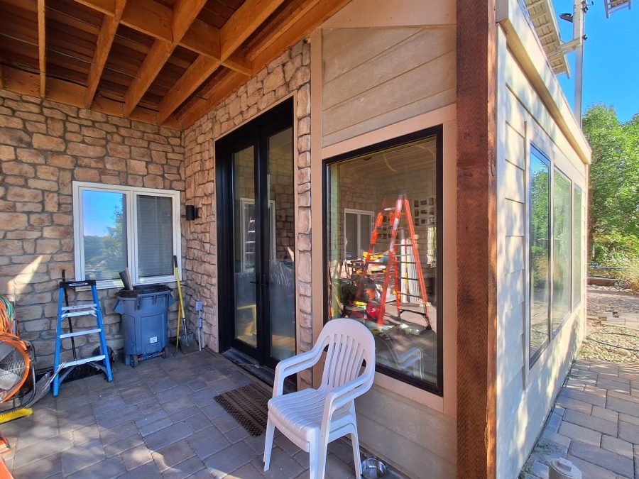 chair on covered patio of house Preview Image 5