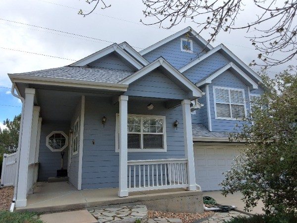 front of house with blue siding Preview Image 14