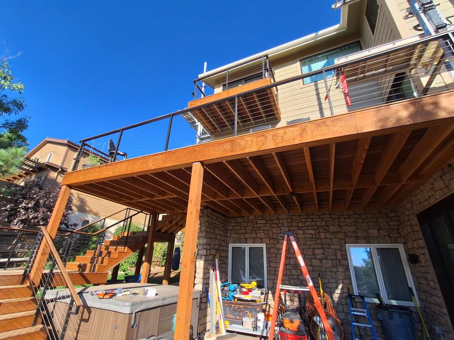 raised wooden deck and patio beneath on house Preview Image 2