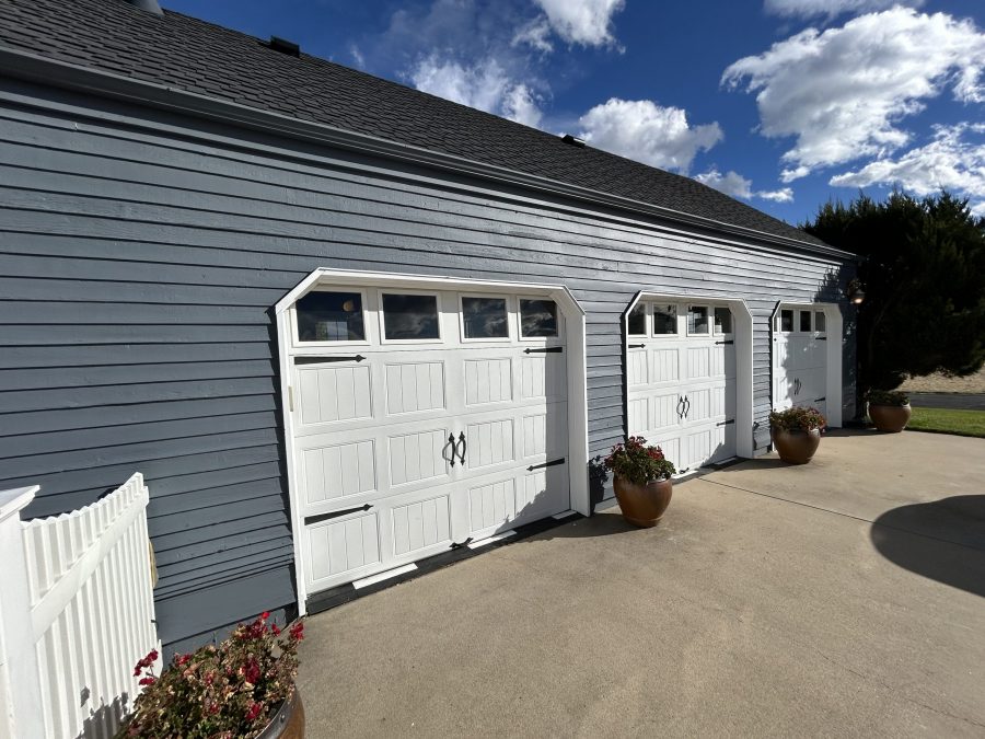 home garage doors with white doors and grey siding Preview Image 7
