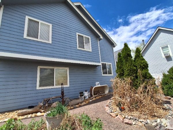 side of house with blue siding Preview Image 2