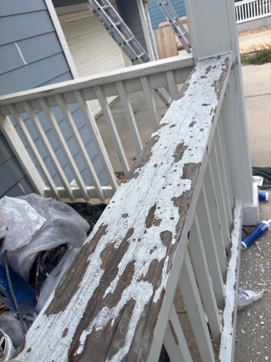 wooden patio railing with paint sanded off Preview Image 6