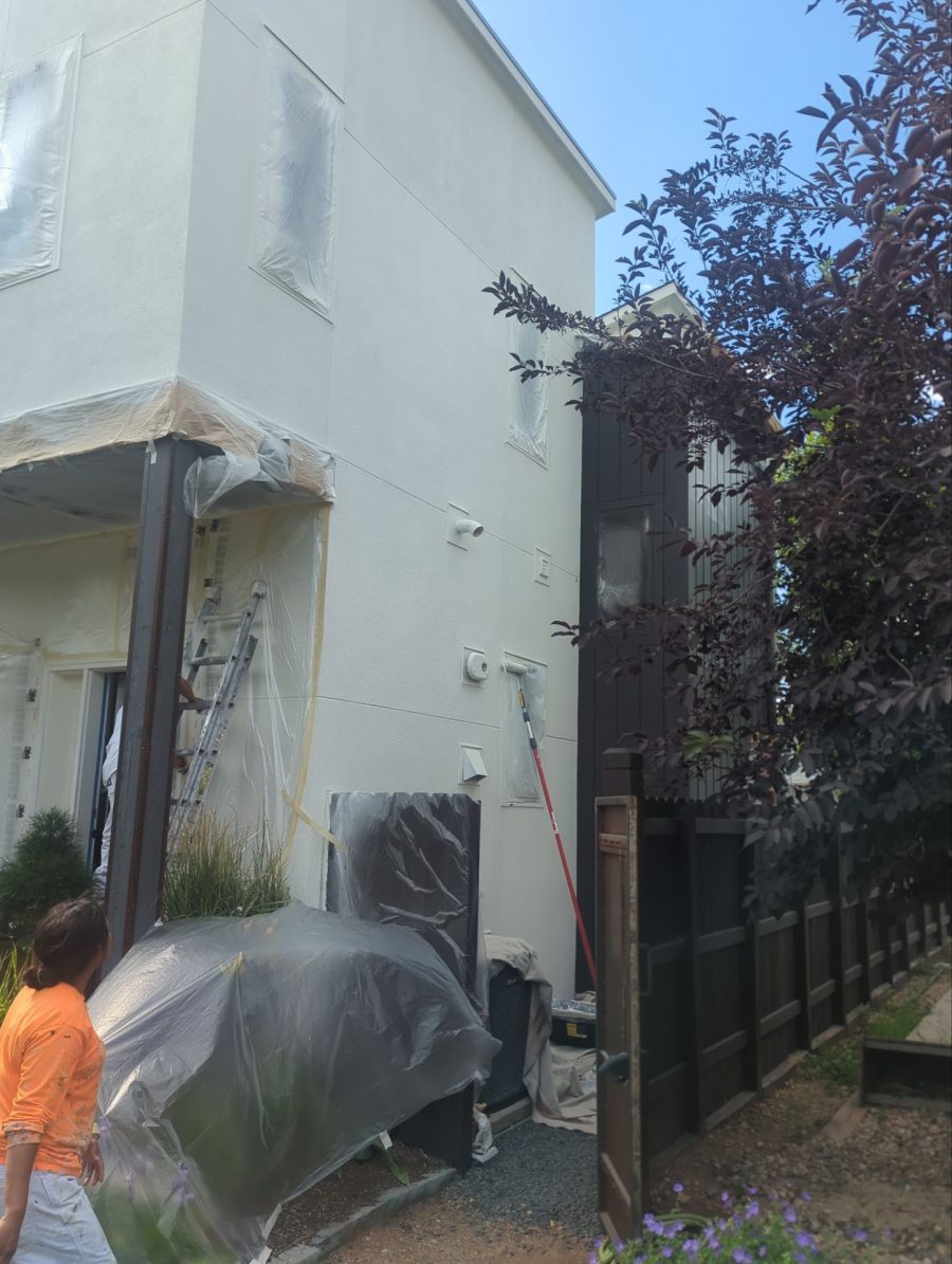 house exterior with plastic coverings during repaint Preview Image 16