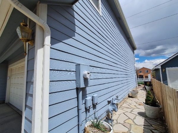 side of house with blue siding Preview Image 1