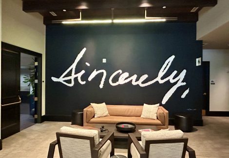 lounge in hotel with couch and chairs