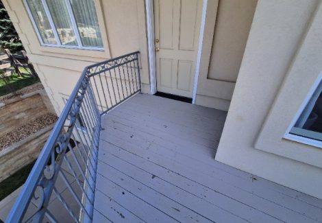 wooden deck with damaged paint