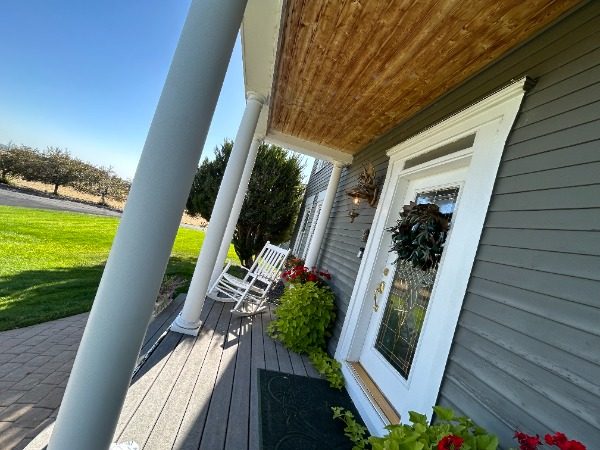 covered front porch and front door of house Preview Image 13