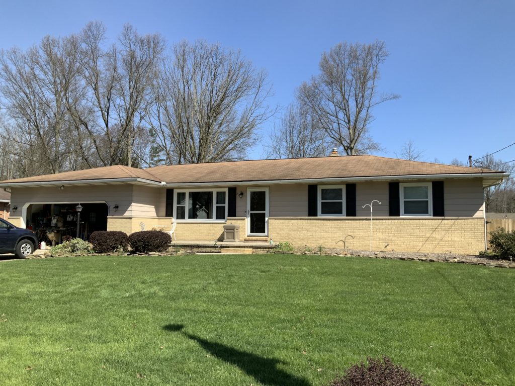 Single-level home exterior in Northfield, OH - Before painting