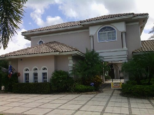 Exterior house painting by CertaPro painters in Cooper City, FL