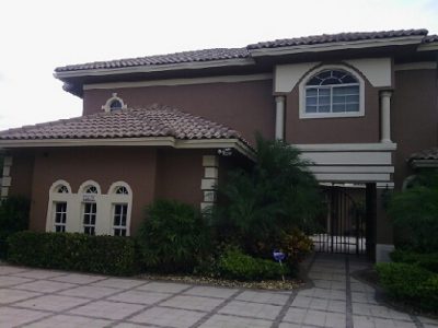 Exterior painting by CertaPro house painters in Cooper City, FL