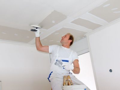 Painter preparing ceiling