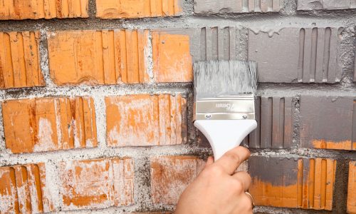 preparation for painting with a primer coat on brick