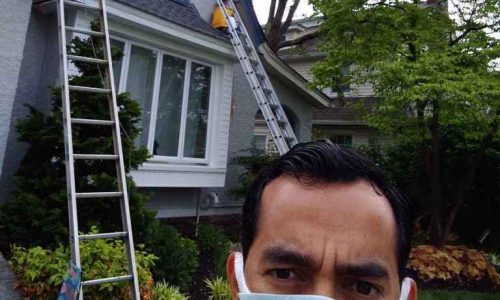 Team David is keeping a safe distance from one another while working on the exterior of this home in Havertown.