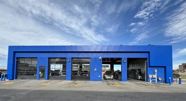 parking lot view of Mr. Lube service building painted blue
