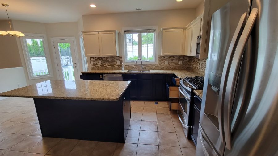 Completed Kitchen Cabinet Painting Project in Lynnfield, MA, by CertaPro Painters of North Shore & Cape Ann, MA - Angle 3 Preview Image 1