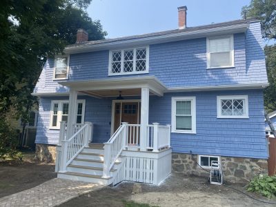Light Blue home in Beverly, MA after completed residential exterior painting project by certapro painters of north shore and cape ann