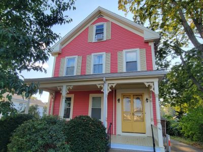 Red home after exterior painting project by certapro painters of north shore and cape ann