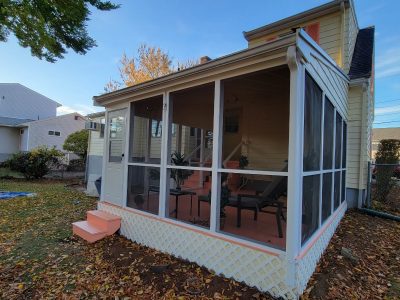 Close up of back porch after completed residential exterior painting project in Melrose, MA, by CertaPro Painters of North Shore & Cape Ann, MA