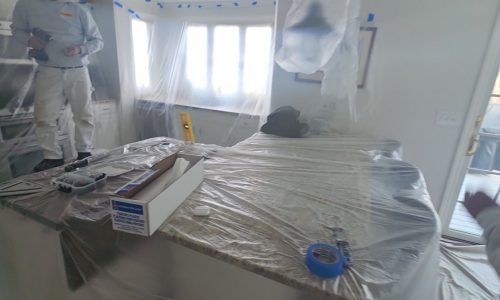 Masking Furniture for Ceiling Repair & Painting