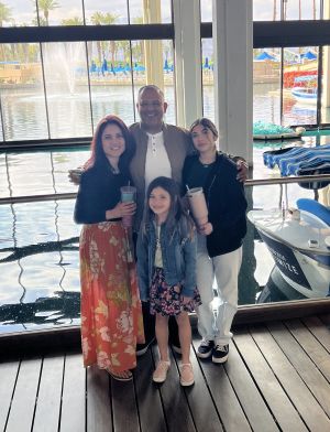 family posing for photo